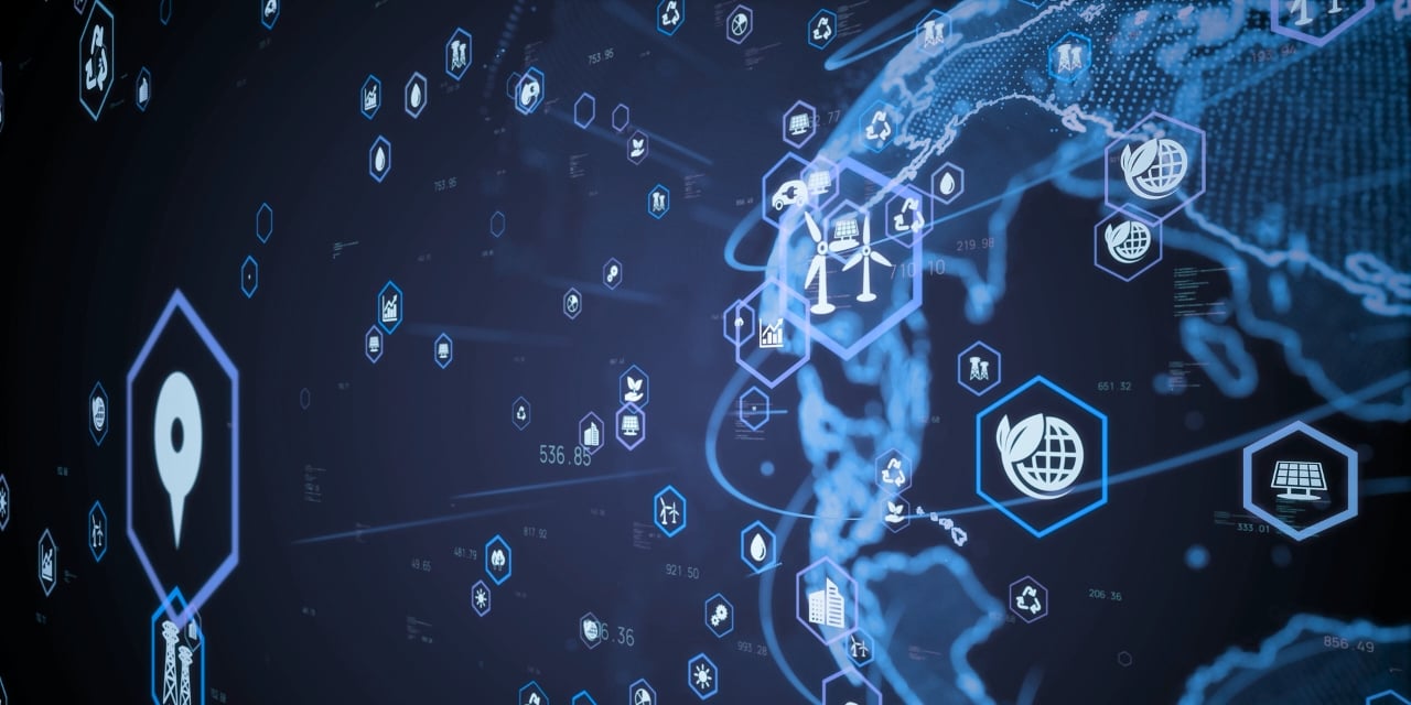 Digital globe with icons for renewable energy, sustainability, and global technology. 