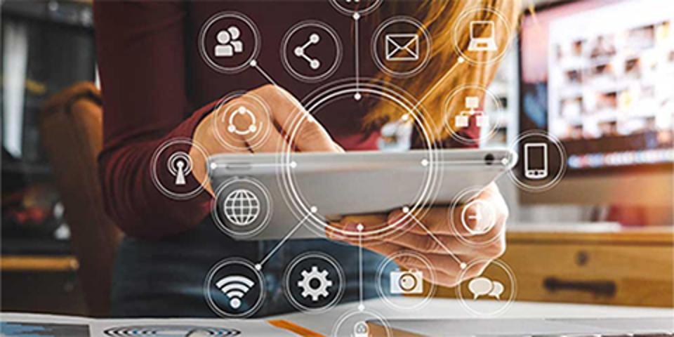 Woman holding a computer tablet with media icons overlaid on the image.