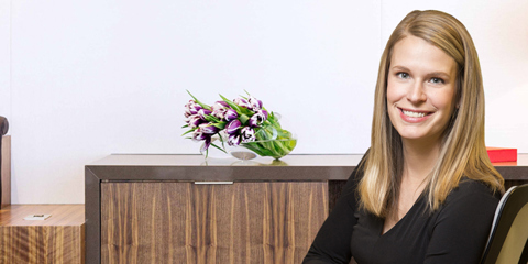 Photo of Joanna Arras sitting in office